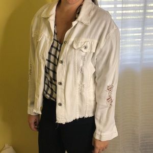 White denim jacket with rips
